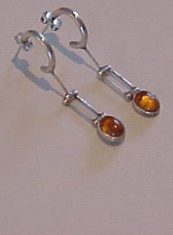 hinged sterling silver with bezel-set amber